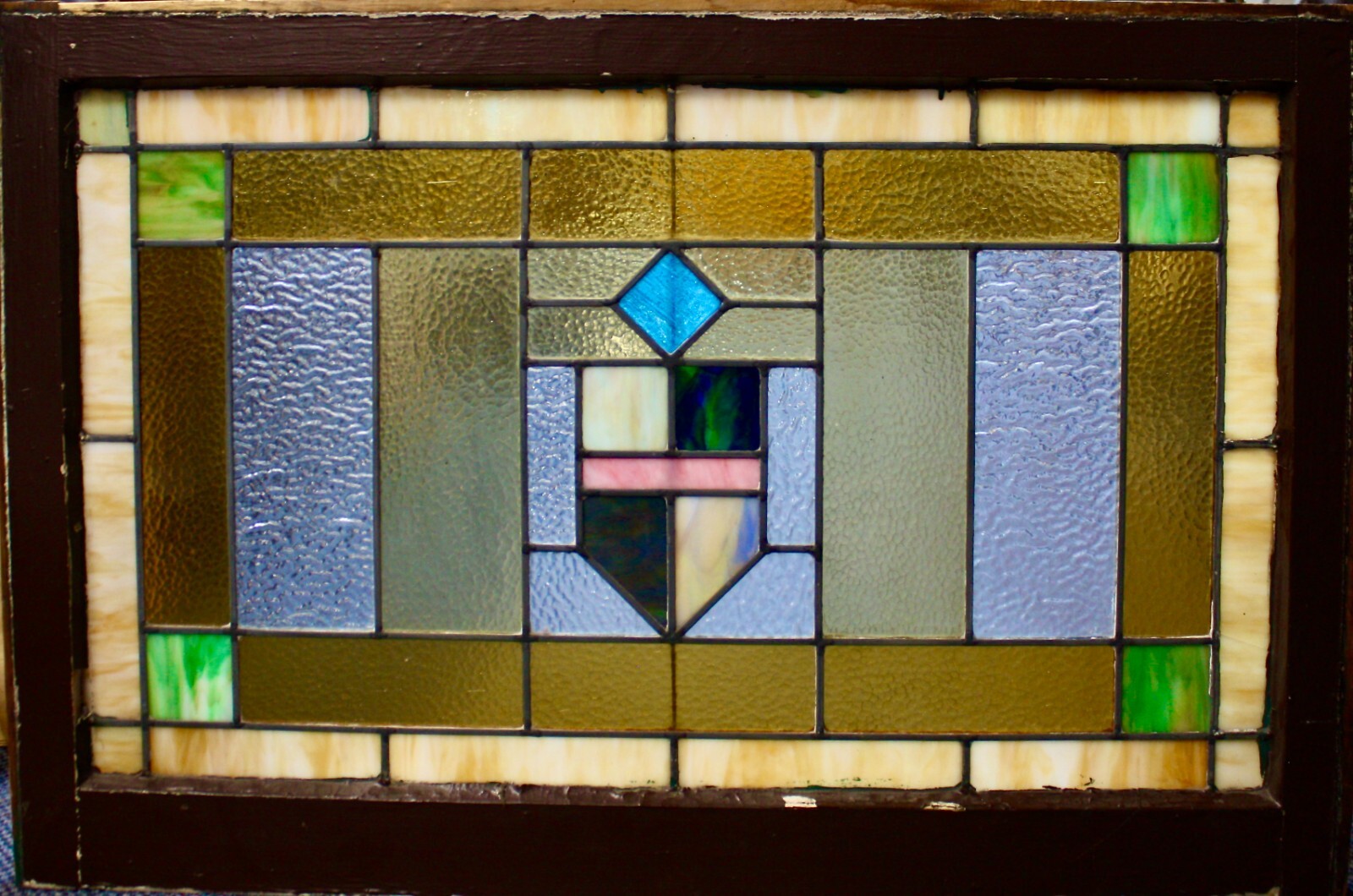 Antique Leaded Stained Glass In Wood Frame. Shield At Center. 24”H x 36”W